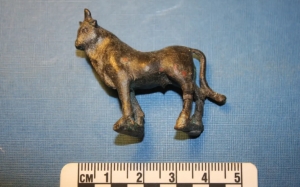 small bronze statue of a bull